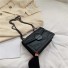 Dámska kožená kabelka s cvočkami M693 čierna