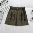 Dámska mini sukňa s vreckami a opaskom armádny zelená