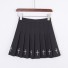 Dámska skladaná mini sukňa s krížmi čierna