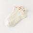 Dámske členkové ponožky s volánikmi biela