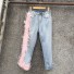 Dámske džínsy s ružovými strapcami 2