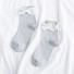 Dámske ponožky s volánikmi sivá