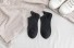 Dámske ponožky s vtipnou výšivkou čierna