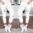 Dámské stylové kalhoty s dírami J828 bílá