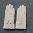 Damskie skórzane rękawiczki z kokardą kość słoniowa