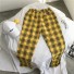 Damskie spodnie w kratę z elastyczną talią A233 1