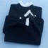 Dámsky sveter s perlami A2344 čierna