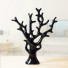 Dekoracyjna rzeźba drzewa czarny