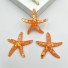 Dekoratív miniatűr tengeri csillag 10 db narancs