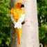 Dekoratív szobor egy papagáj sárga