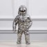 Dekorativní soška astronauta stříbrná