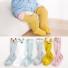 Dětské dlouhé ponožky s oušky žlutá