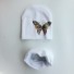 Dětský set čepice a nákrčník s motýlem bílá