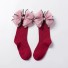 Dievčenské dlhé ponožky s mašľou červená