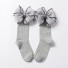 Dievčenské dlhé ponožky s mašľou sivá