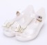 Dievčenské gumové sandále s motýľom biela