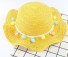 Dievčenské klobúk s brmbolcami žltá
