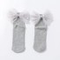 Dievčenské ponožky s veľkou mašľou a perlami sivá