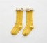 Dievčenské ponožky s volánikmi tmavo žltá