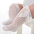 Dívčí pletené ponožky s mašlemi bílá