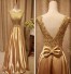 Długa sukienka balowa złoto