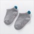 Dojčenské ponožky s brmbolcom sivá