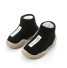 Dojčenské ponožky s gumovou podrážkou čierna