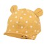 Dziecięca czapka z daszkiem w groszki z uszami żółty