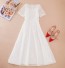 Elegantní dámské šaty s perličkami bílá