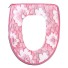 Husă moale pentru un scaun de toaletă cu flori roz