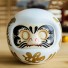 Japanische Daruma-Figur weiß