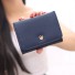 Mały portfel damski z koroną ciemnoniebieski