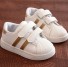 Moderne Kinder-Sneaker golden