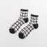 Női áttetsző kockás zokni A1052 fekete