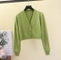 Női rövid pulóver gombokkal világos zöld