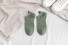Női zokni vicces hímzéssel zöld