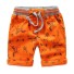 Pantaloni scurți pentru băieți cu imprimeuri J2533 portocale