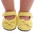 Pantofi cu o panglică pentru o păpușă galben