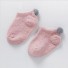 Șosete pentru bebeluși cu pompon roz