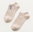 Štýlové ponožky s obrázkami krémová