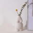 Vaza decorativă în formă de corp de femeie alb