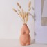 Vaza decorativă în formă de corp de femeie portocale